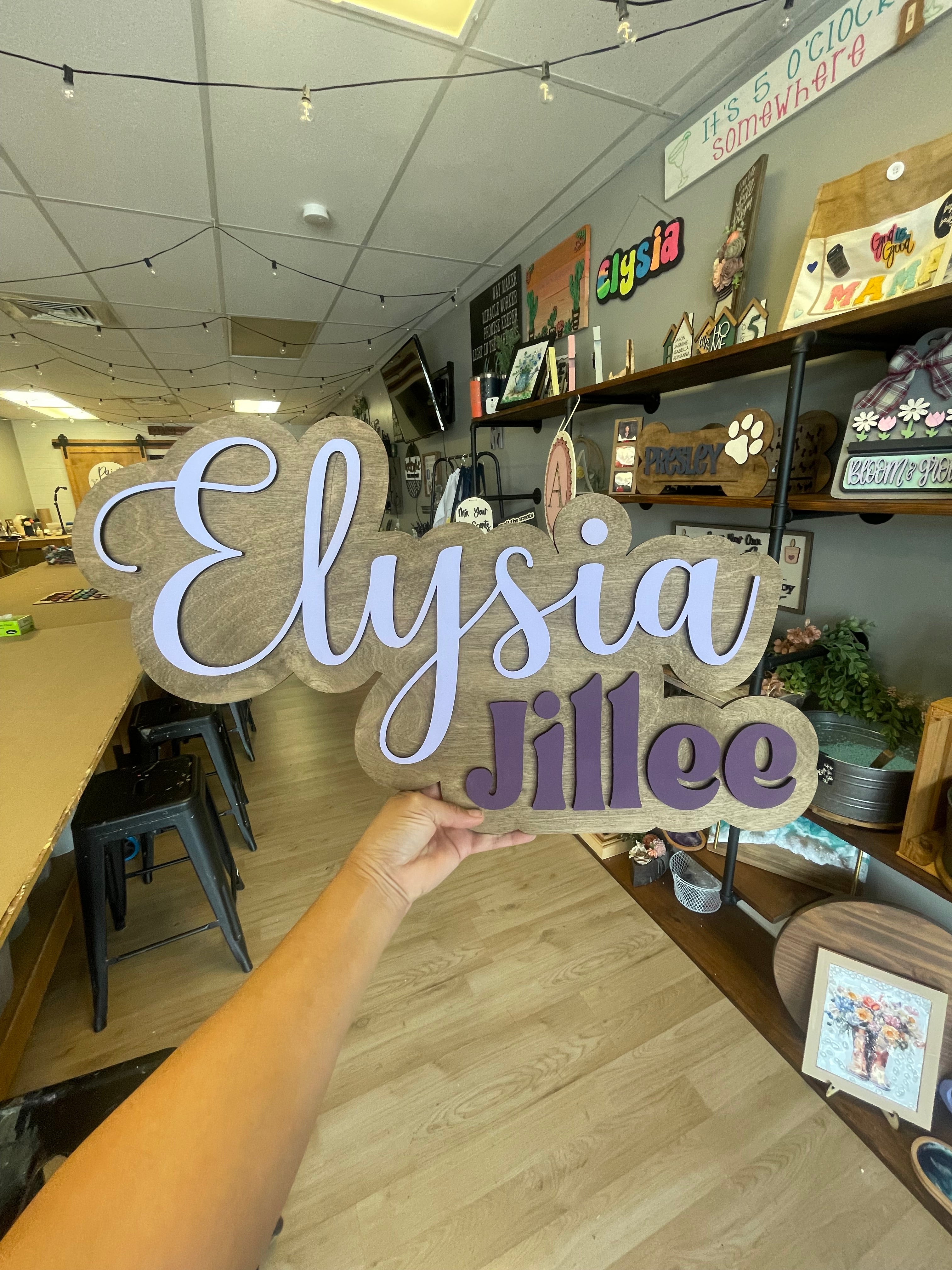 Name layered wall sign