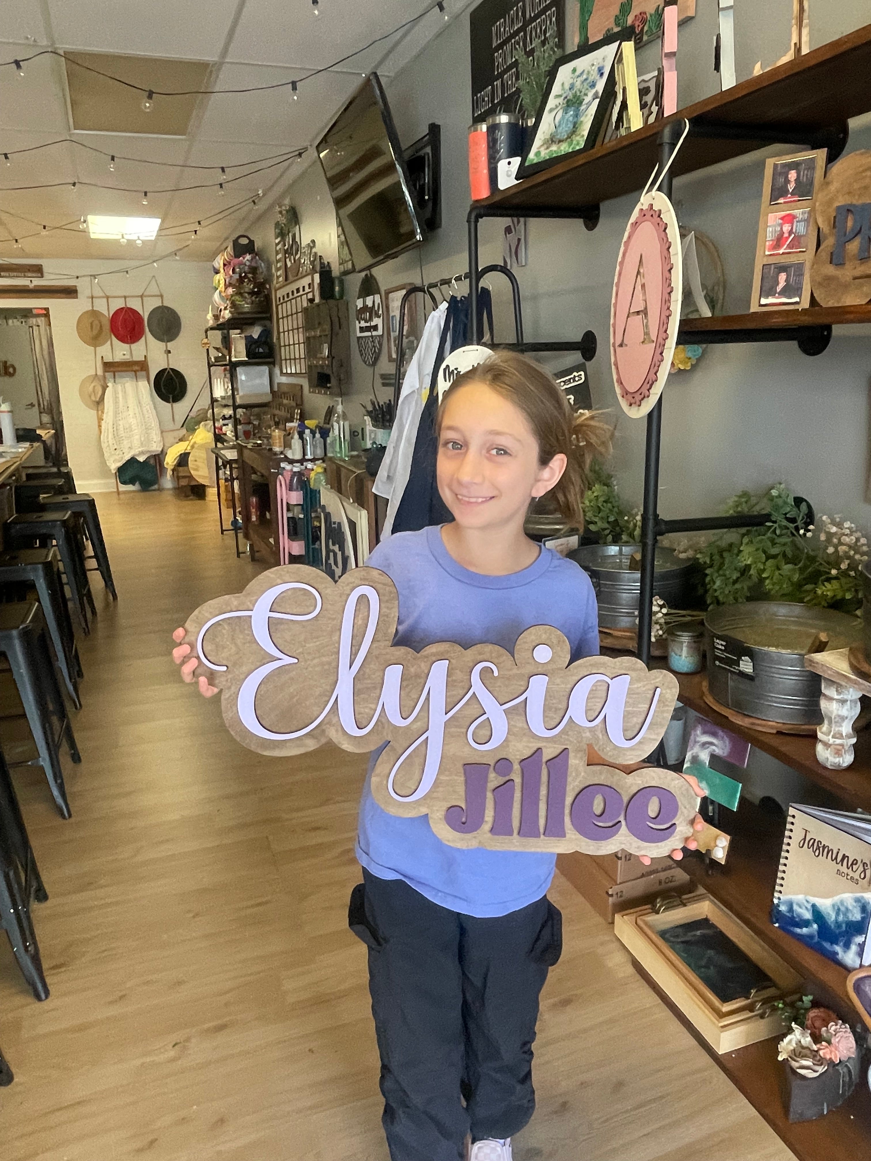 Name layered wall sign